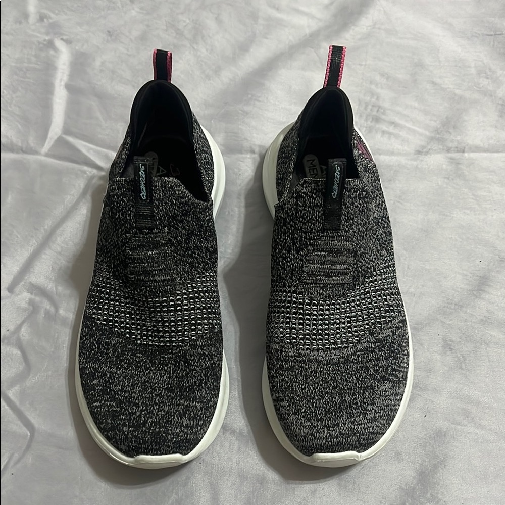 Grey and White Slip-On Skechers Sneakers